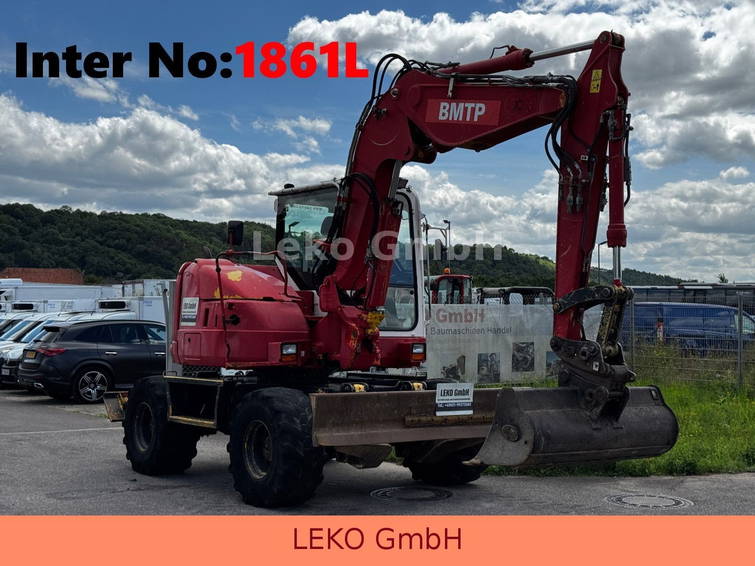 Komatsu PW118MR-8 Mit Drei Löffeln 1